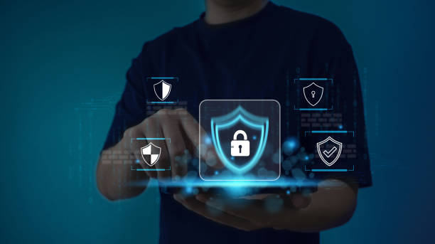 istock Businessman use secure tablet encryption technology, protect business and financial transaction data from cyber attacks, intelligent protection digital attacks. Cybersecurity and data protection. 1891344024