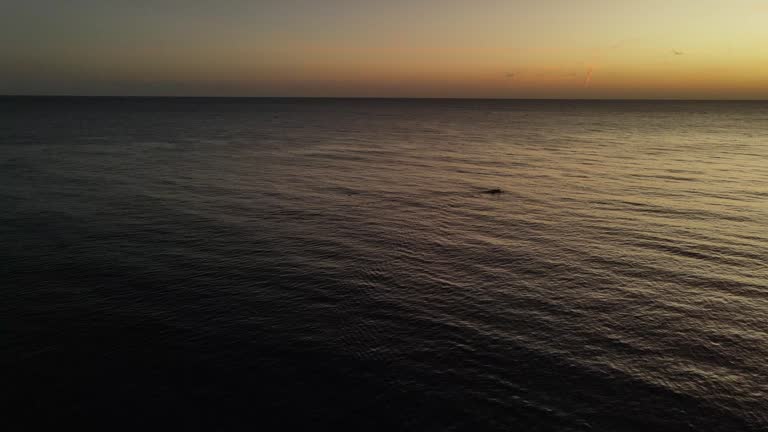 Aerial view of beautiful sunrise at Amed beach, Bali, Indonesia