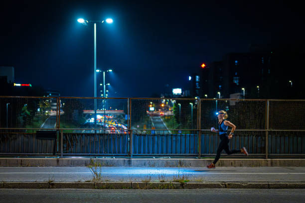 istock Woman running in city 1891425337