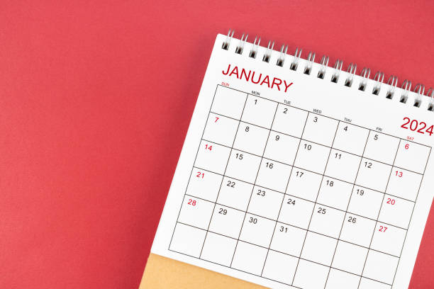 istock January 2024 desk calendar on red background. 1891433897