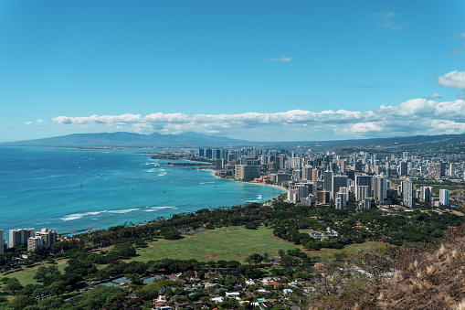 View of Honolulu, Hawaii on the island of Oahu from the Diamond Head Summit Trail viewpoint on a beautiful, sunny day.