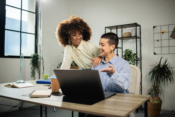 istock Two young women cooperating at their office 1891460262