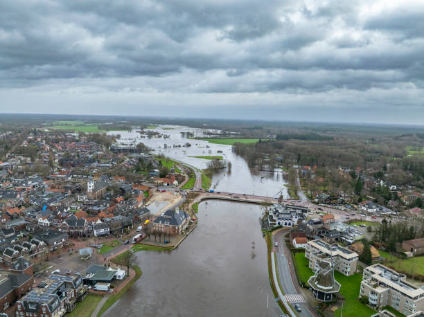 istock Vecht river high water level flooding in Ommen drone view 1891577303