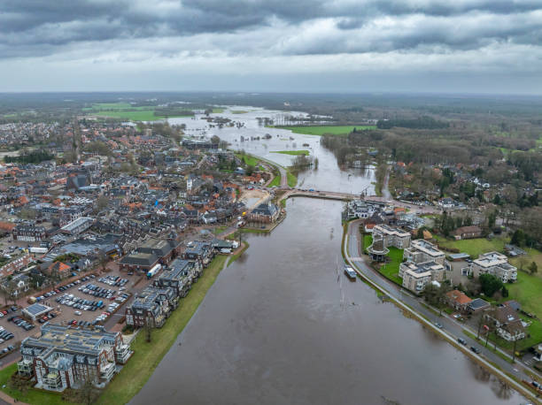 istock Vecht river high water level flooding in Ommen drone view 1891579421