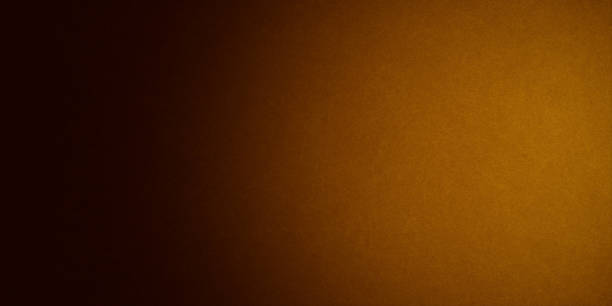 istock Horizontal yellow and orange grunge texture cement or concrete wall banner, blank background 1891624190