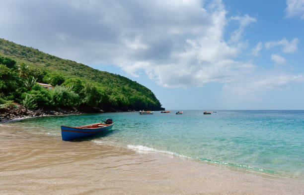 istock Beach and fishing boat, Martinique 1891633100