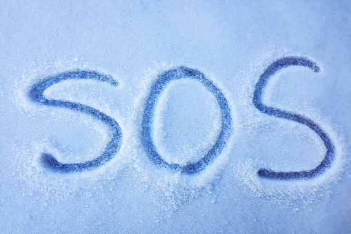 SOS on white snow
