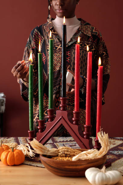 istock Young woman igniting seven candles 1891668195