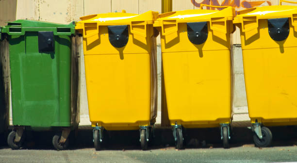 istock Green and yellow garbage bins for recycling purposes. 1891714873