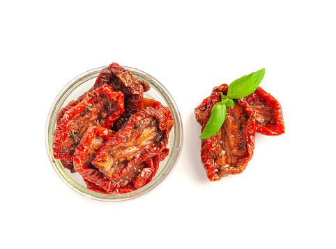 Dry Tomatoes in Bowl Isolated, Sun Dried Pomodoro Pile, Dehydrated Tomato In Olive Oil, Cured Sundried Vegetable Slices, Dry Plum Tomatoes, Italian Snack on White Background