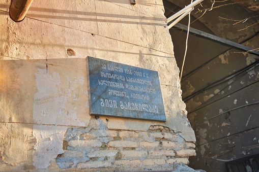 Tbilisi, Georgia - 04 January, 2023: Old City center. Memorial plaque in Georgian