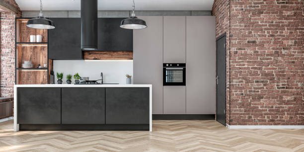 istock Front view of a modern high black and gray kitchen with rectangular black and white marble breakfast kitchen island and brick wall background 1891787240