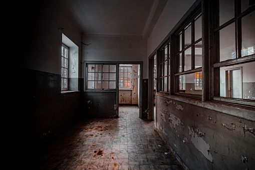 Kolmanskop Historic Diamond Mining Ghost Town Building Corridor Interior Panorama. Nature is coming back. Desert Sand entering the old abandoned german colonial building in the old deserted Diamond Mine Ghost Town at Kolmanskop, Lüderitz, Namibia, Africa.