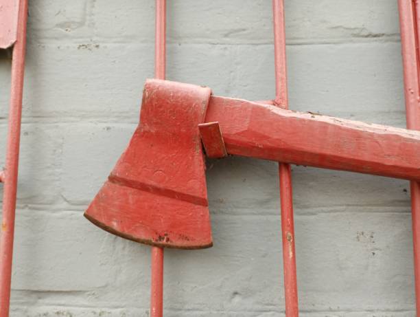 istock The ax on the improvised fire shield is sloppily painted with red paint. Hand tools for extinguishing fires. 1891874486