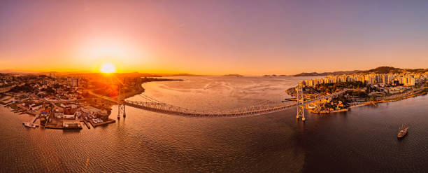 istock Panoramic view of Hercilio luz cable bridge with sunset light in Florianopolis, Brazil 1891907540