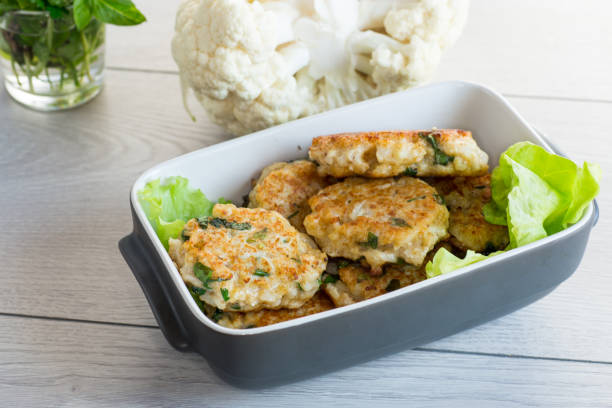 istock cooked vegetarian fried cauliflower cutlets in a ceramic form . 1891911245