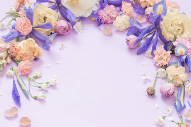 istock beautiful spring flowers on paper background 1891926221