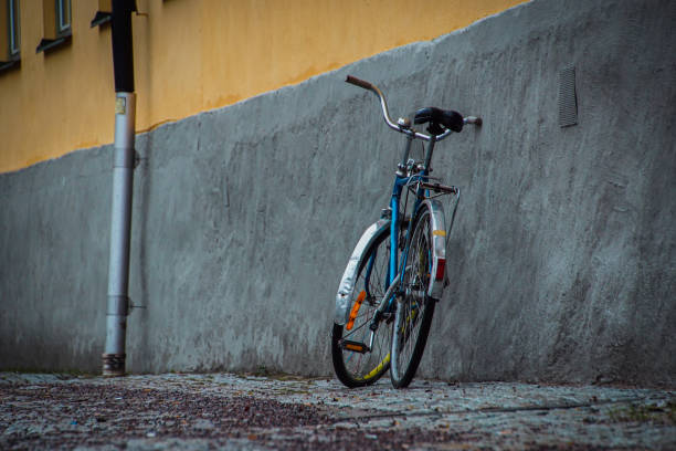 istock a bicycle leaning against the house wall 1891971020