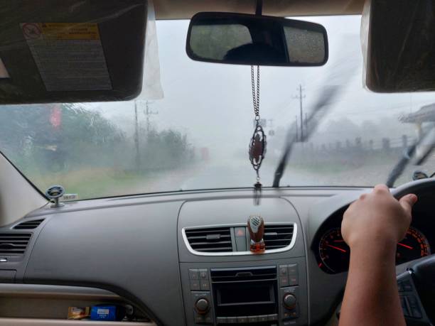 istock view of heavy rain from inside the car 1892000885