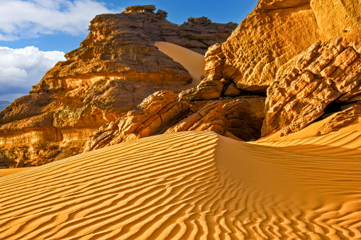 Fascinating view of the rippled sand and rocks near the Timimoun in the Algeria