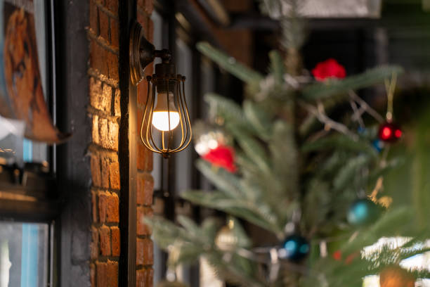 istock antique electronic lamp red wall lamp tall wall lamp Soft light from the window Blurred Christmas tree background decorated with lights 1892151614