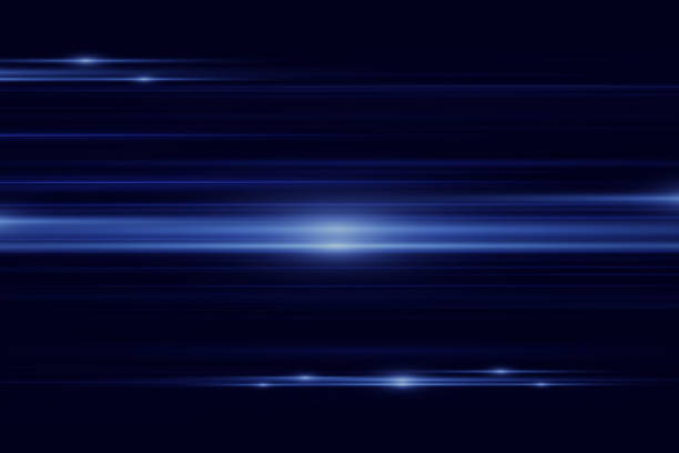 istock Glowing stripes. Beautiful flashes of light on a dark background. Glowing abstract sparkling background with light effect. 1892165239