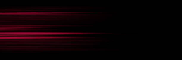 istock Glowing stripes. Beautiful flashes of light on a dark background. Glowing abstract sparkling background with light effect. 1892165775