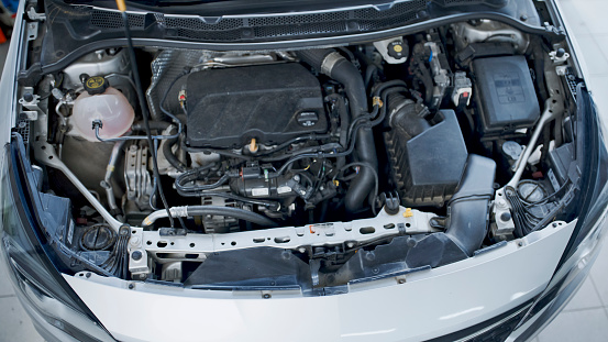 Car Engine For Inspection And Maintenance Service At Auto Repair Shop
