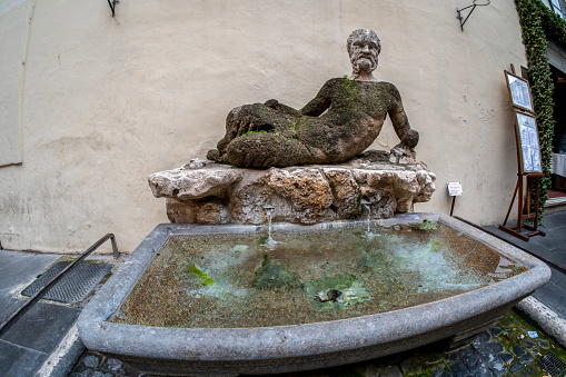 Rome, Lazio, Italy: The Babuino fountain is located along the street of the same name, right next to the church of Sant'Atanasio dei Greci