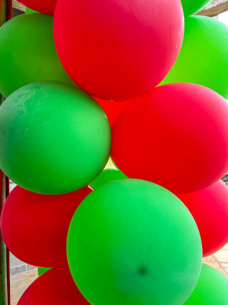 istock Red and green balloons 1892280419