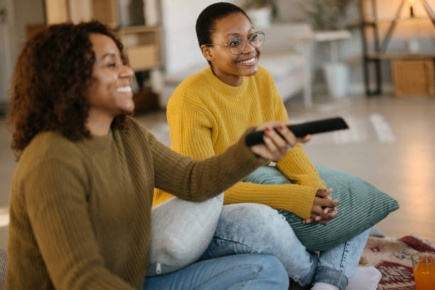istock Girlfriends are watching their favorite tv show 1892313167