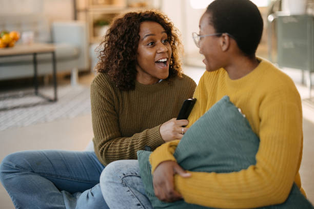 istock Girlfriends are watching their favorite tv show 1892314199