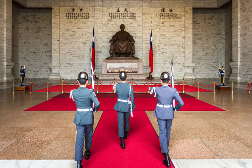 Taipei, Taiwan - February 22, 2017: Soldiers stand guard at the Chiang-kai Shek Memorial Hall.