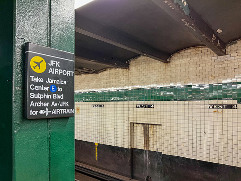 5/19/2023 - Downtown Manhattan, New York City, NY, USA: Subway sign to John F. Kennedy Airport in Manhattan