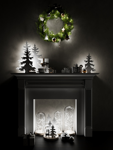Advent wreath from evergreen branches with white candles, the first is burning for the time before Christmas, dark snowy background with copy space, selected focus