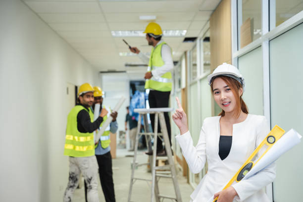 istock Engineers meet in the office to work on an architectural project as a team. Team of Professionals Engaged in Architectural Project Planning and Design. 1892420430