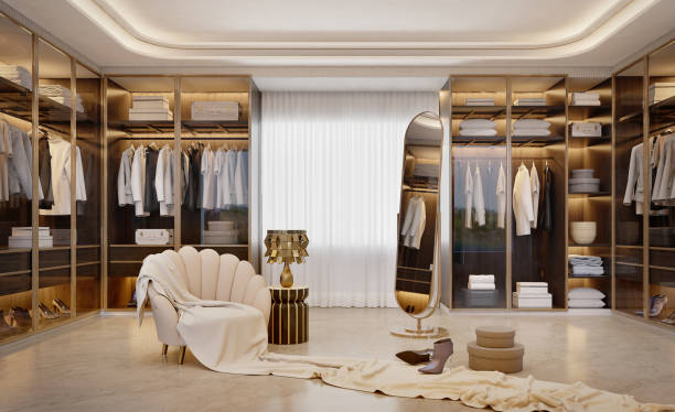 istock Luxury walk in closet interior with armchair and mirror.3d rendering 1892422676