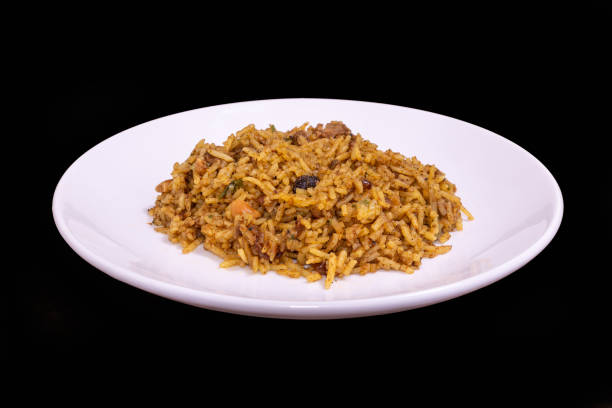 istock Sri Lankan biryani on a white plate against a black background 1892520849