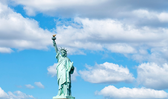 The Statue of Liberty is located on Liberty Island in New York Harbor. Designed by French sculptor Bartholdi (1886), it was a gift from the people of France. The statue is an icon of the United States and freedom. It has been a welcome sign for immigrants arriving from abroad.