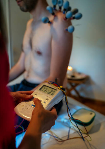istock Health Care acupuncture concept, A man is being treated using acupuncture electric stimulation treatment to relax Body Muscle 1892670113