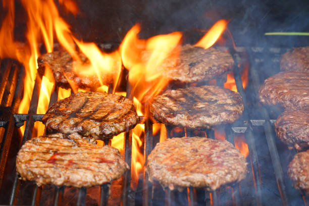 istock barbecue grill cooking burger steak on the fire 1892701919