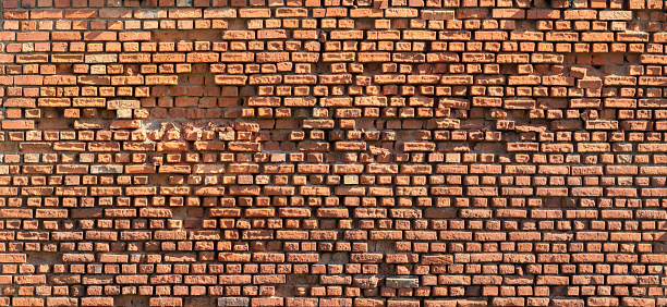 Earthen Elegance: The Intricate Patterns of a Brick Facade