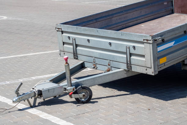 istock Trailer for a car in the parking lot 1892743302