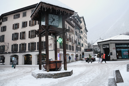 Chamonix, France - December 9, 2022. December snowfall and city view in Chamonix Centre-ville, French alps resort, Haute Savoie , France.