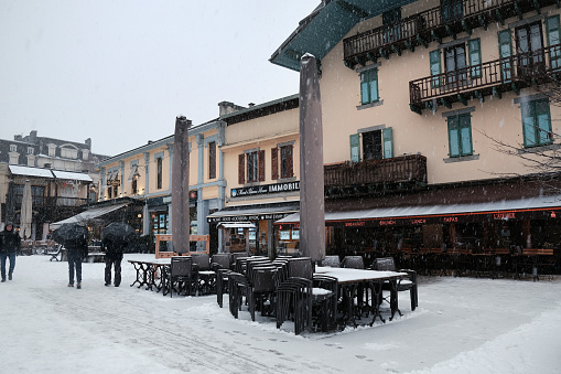 Chamonix, France - December 9, 2022. December snowfall and city view in Chamonix Centre-ville, French alps resort, Haute Savoie , France.