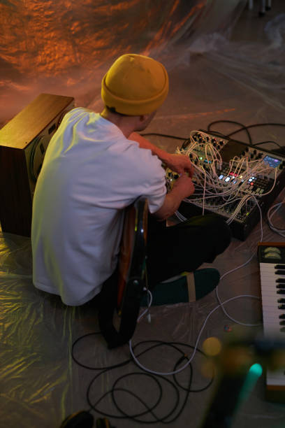 istock Male Musician Adjusting Sound Mixer 1892778788