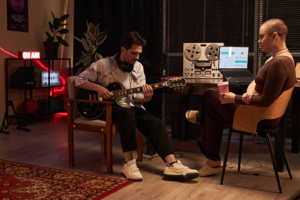 Musician Playing Guitar during Podcast