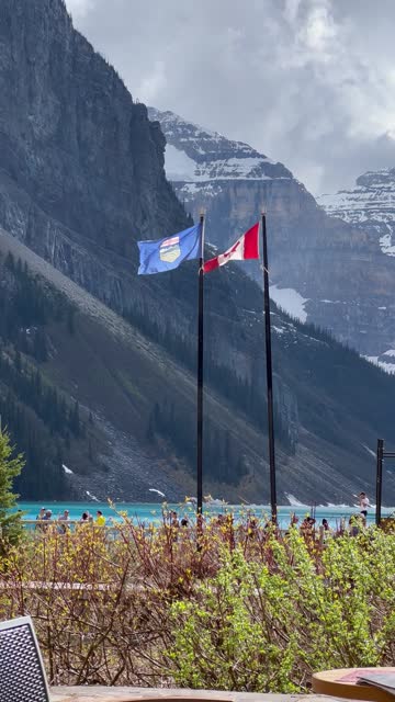 Alberta and Canadian flags at Lake Louise, Canada