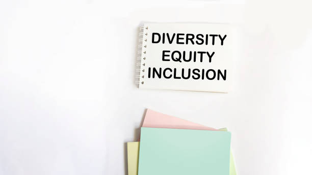 istock Diversity, equity, inclusion DEI symbol. On the notepad are the words DEI, diversity, equity, inclusion. White background. 1892832237
