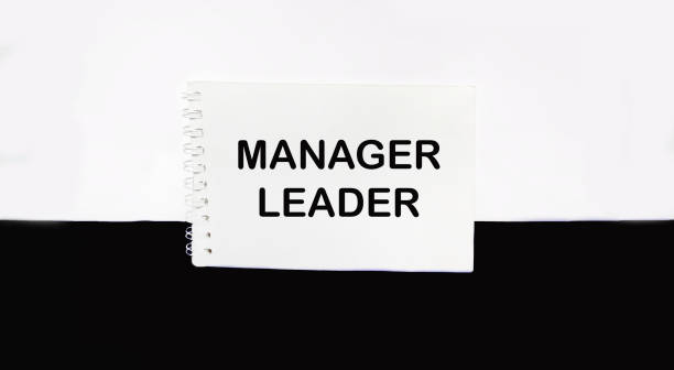 istock Manager and leader, written on a notepad. Beautiful white and black background, copy space. 1892832239